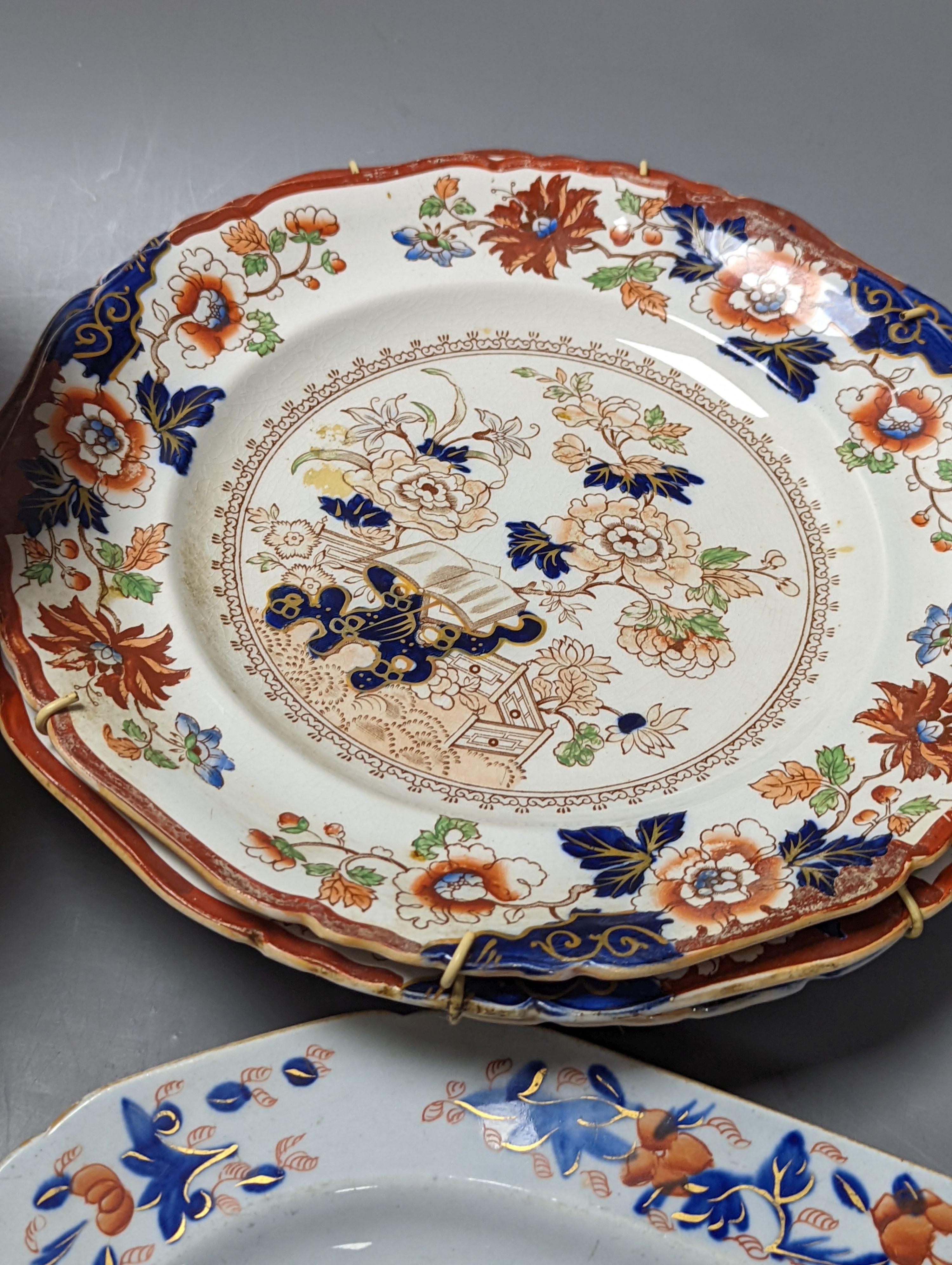 Three Masons plates, a similar platter, two armorial plates and a Japanese bowl, stoneware platter 29 cms wide.